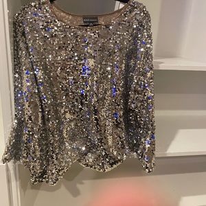 Silver bell sleeve sequin top size XL.
